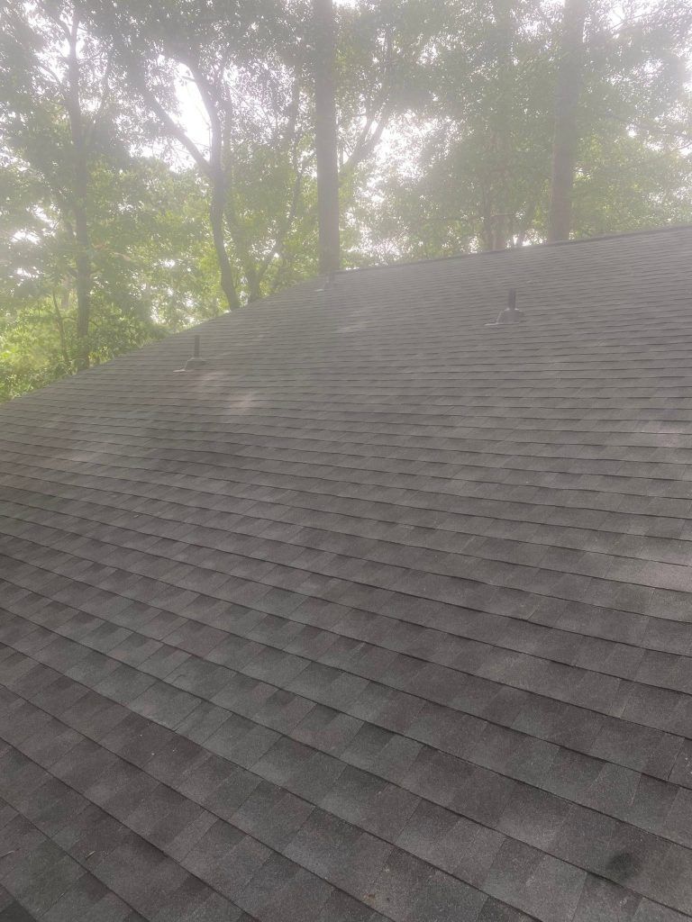 Close-up of a newly installed asphalt shingle roof